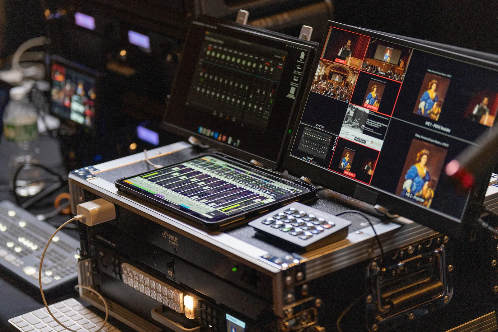 Theater production — dual monitors and tablet audio control at FOH